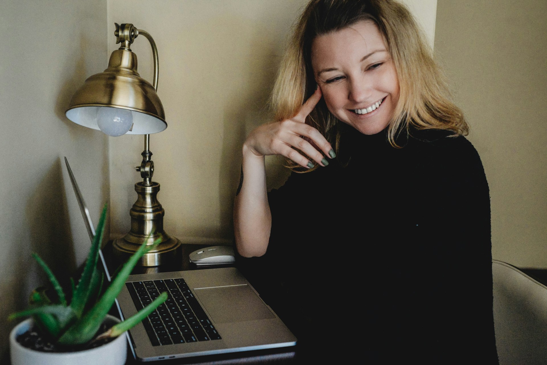 woman happy at computer
