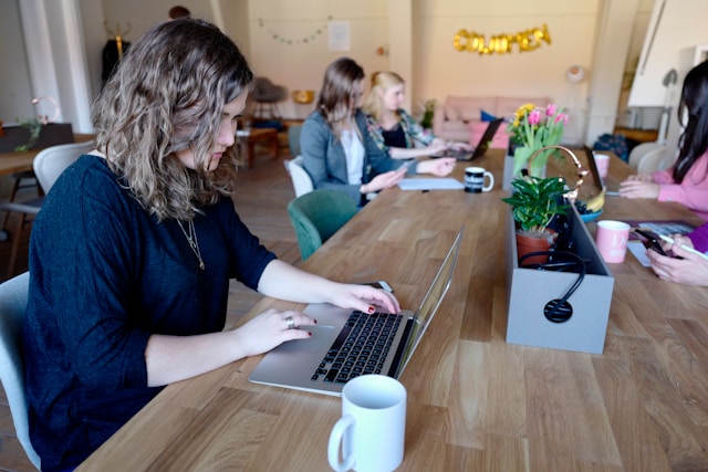 woman working in a co-working space intentionallyflourish.com