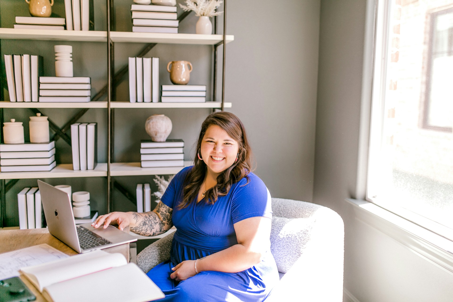 woman working in organized space with books - intentionallyflourish.com