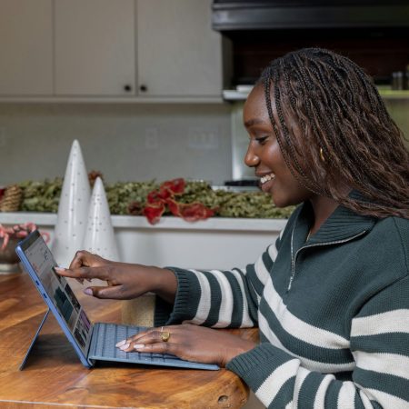 female author learning on laptop - intentionallyflourish.com